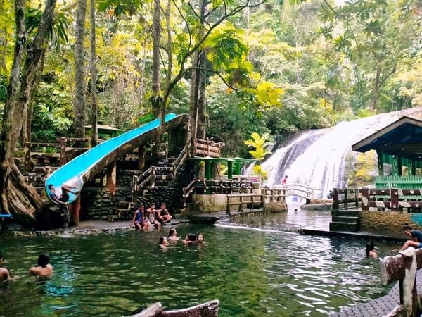 <b class="font-bara"><i class="bi bi-geo-fill h4"></i> GREEN FALLS MOUNTAIN LIESURE FARM & RESORT</b> <br/>Cagpangi Falls located at Brgy. Cabangahan is small and quiet, as it flows, it mesmerizes with its delicate beauty and watery grace. Canopied by a thick foliage that blows a cold mountain air.